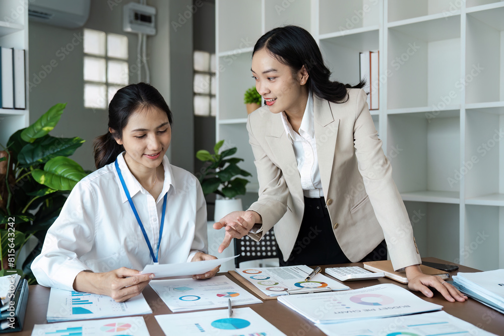 Businesspeople are meeting for analysis data figures to plan business strategies. Business discussing concept Businesspeople are meeting for analysis data figures to plan business strategies. Business discussing concept