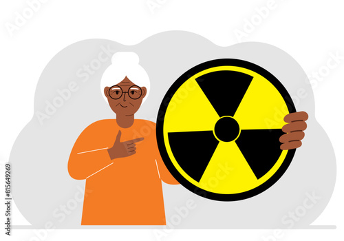 A woman holds in his hand a large sign warning about radiation danger. Vector flat illustration