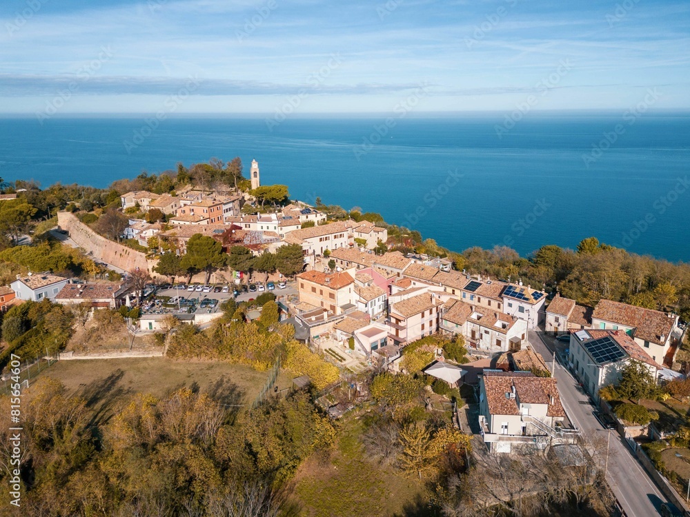 Obraz premium View of the picturesque medieval village of Fiorenzuola di Focara immersed in the San Bartolo Park