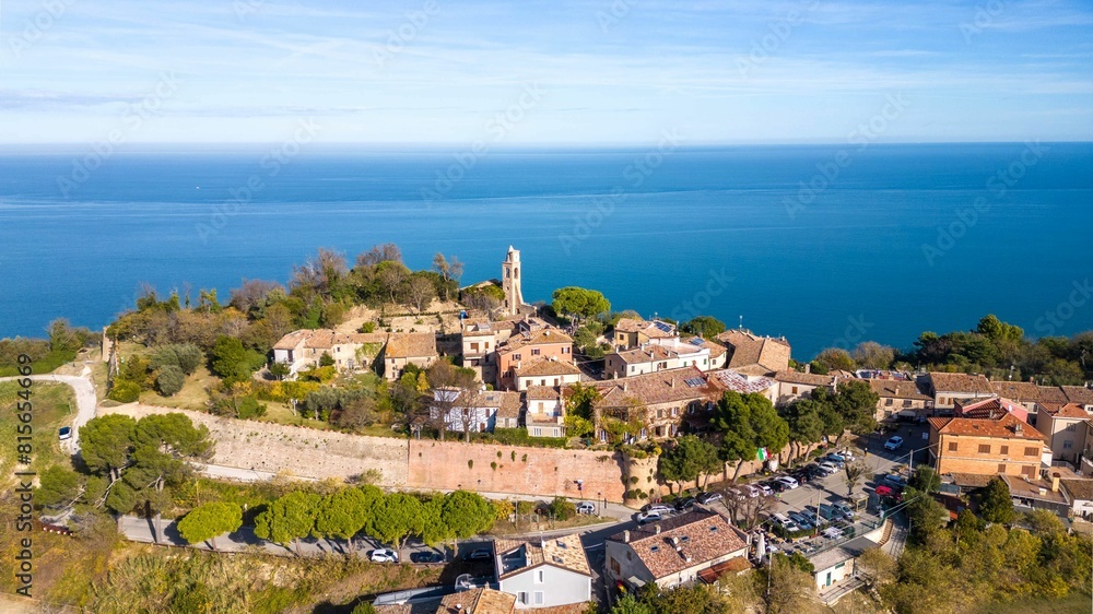 Aerial view of the small medieval village of Fiorenzuola di Focara immersed in the San Bartolo Park Aerial view of the small medieval village of Fiorenzuola di Focara immersed in the San Bartolo Park