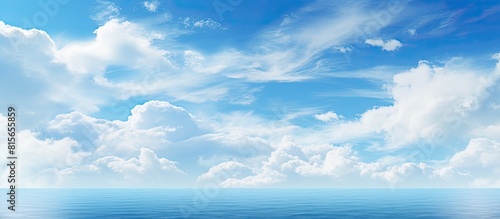 Blue sky background with clouds at the ocean Copy space