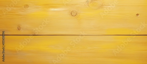 A decorative device on a yellow background with space for text The concept of home interior about a child top view yellow wooden background. copy space available