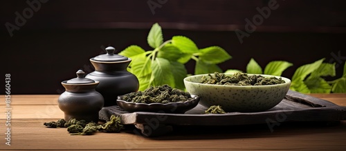 Flat lay composition with cups of Tie Guan Yin oolong tea and space for text on table. copy space available photo