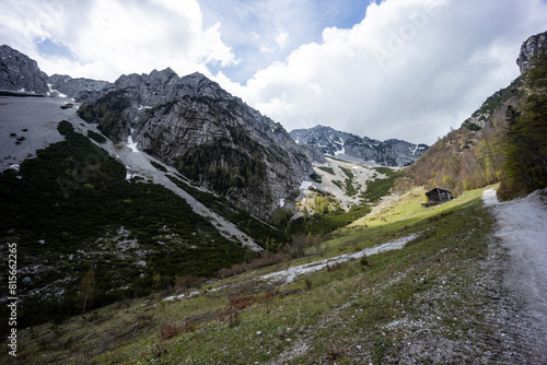 Begunjščica panorama of mountain trekking to the highest peak. View of the Alps, climbing with via ferrata. Distant view of Lake Bled from above. Sports holidays, life of adventure in the countryside. photo