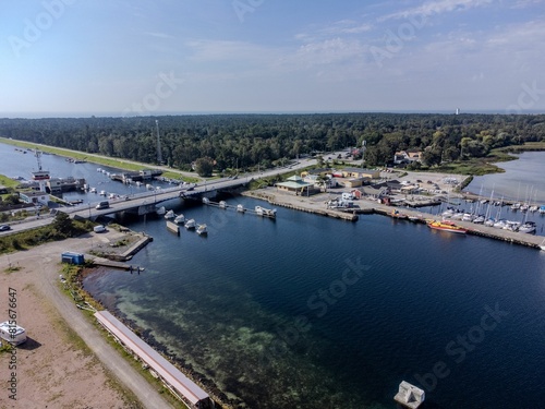 Wallpaper Mural A collection of small boats arranged in a picturesque harbor : Sweden, Ales stenar Torontodigital.ca
