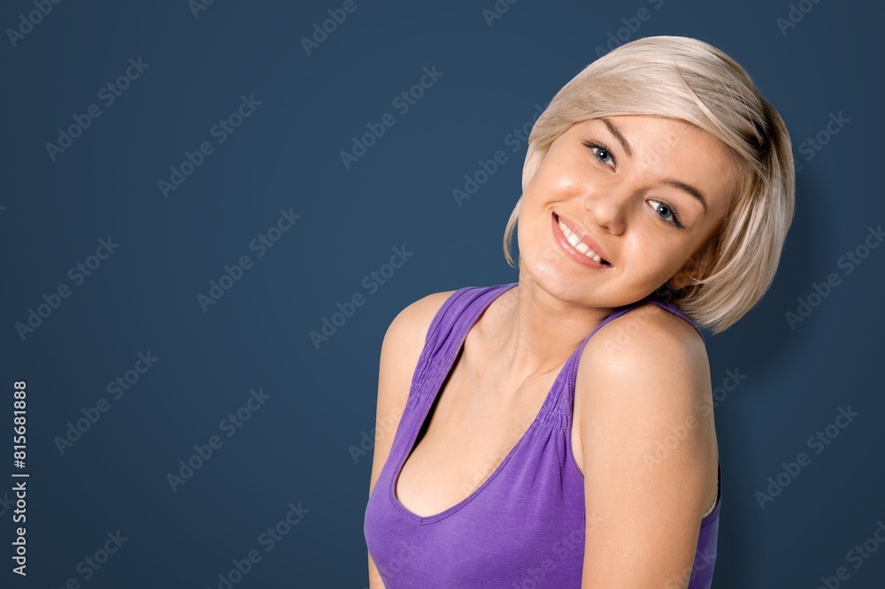 Casual young woman smiling at camera Casual young woman smiling at camera
