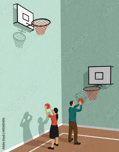 Man with lower basketball hoop than woman