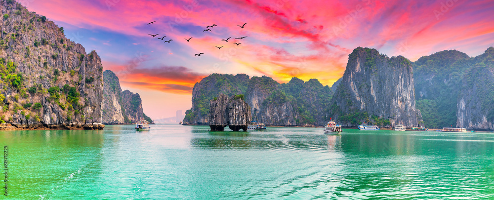Dreamy sunset landscape Halong Bay, Vietnam view from adove. This is the UNESCO World Heritage Site, a beautiful natural wonder in northern Vietnam