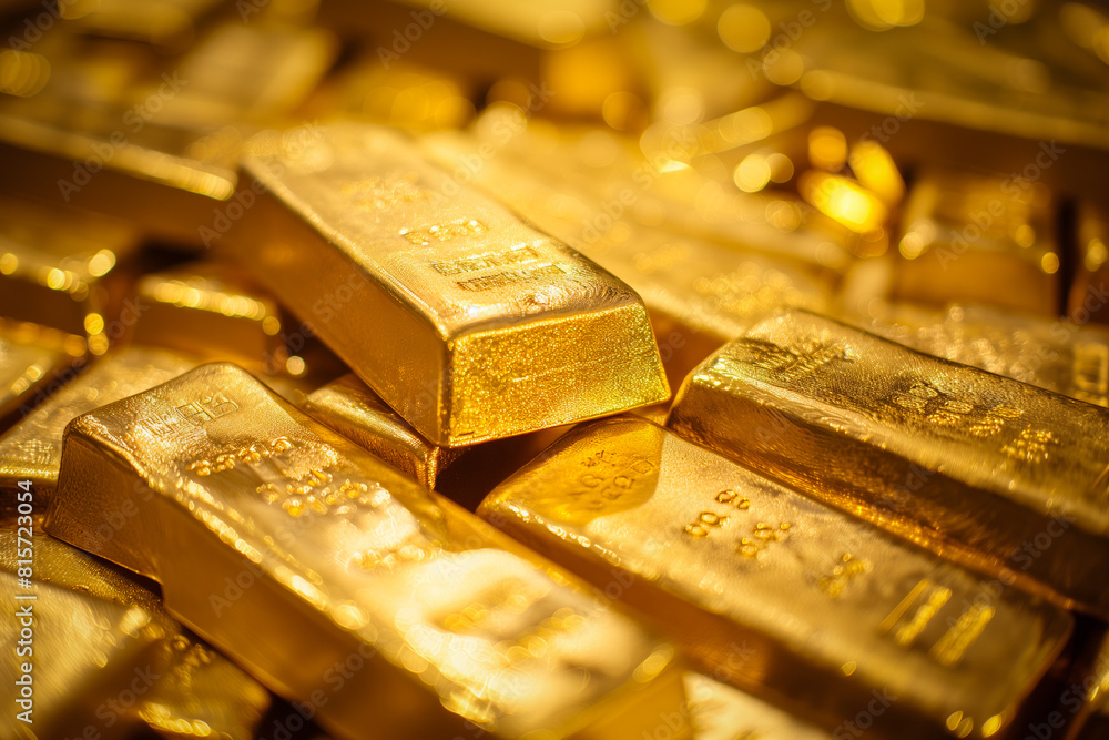 A pile of gold bars bullions close up A pile of gold bars bullions close up