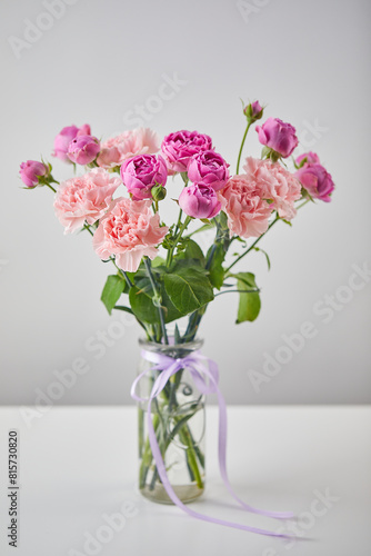 Wallpaper Mural Bouquet of lilac roses and pink carnations Torontodigital.ca