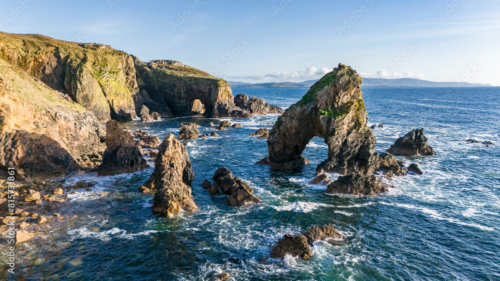 Aerial view of the Crohy Head Sea Arch, County Donegal - Ireland. Aerial view of the Crohy Head Sea Arch, County Donegal - Ireland.