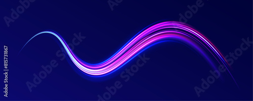 Expressway in long delay, with car lights at night on autobahn. Abstract light lines of movement and speed with purple color sparkles. 