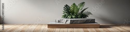 The sleek design of the product podium stands out against the abstract backdrop of a textured stone wall and vibrant tropical foliage.