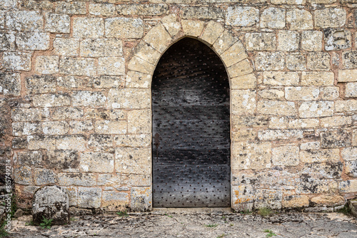 Old door of the church of Montferrand-du-Périgord