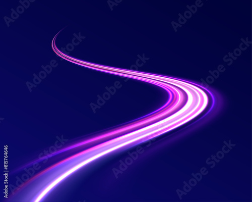 Light motion trails. High speed motion blurred light effects at night in blue and red colors. Glowing spark swirl trail tracing on dark blue background. Abstract light lines of movement and speed. 