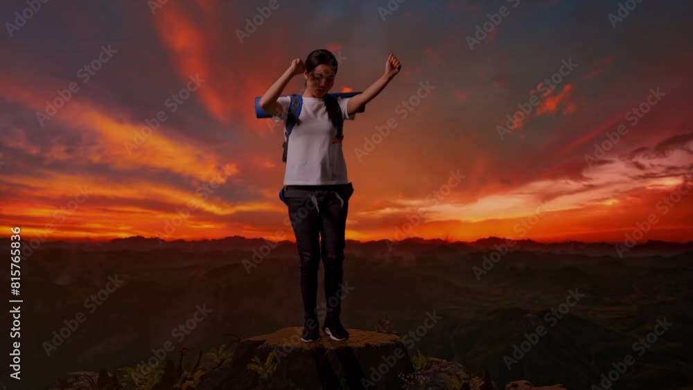 Full Body Of Asian Female Hiker With Mountaineering Backpack Enjoy Dancing On The Top Of Mountain During Sunset Time Full Body Of Asian Female Hiker With Mountaineering Backpack Enjoy Dancing On The Top Of Mountain During Sunset Time