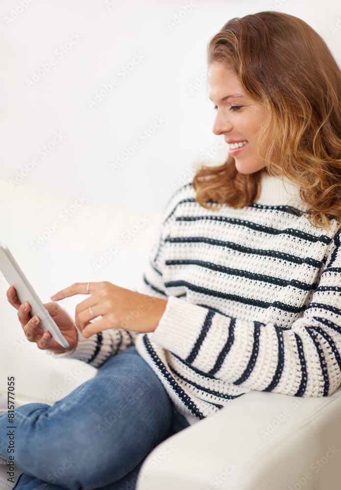 Woman, tablet and scroll on sofa in home with smile for ebook, story or reading with subscription on web. Girl, person and digital touchscreen for app, social media or streaming movie on lounge couch Woman, tablet and scroll on sofa in home with smile for ebook, story or reading with subscription on web. Girl, person and digital touchscreen for app, social media or streaming movie on lounge couch