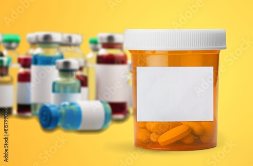 medication bottle with pills with blank label photo