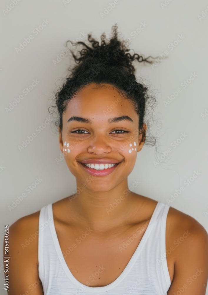 portrait of a black woman with cream on her face portrait of a black woman with cream on her face