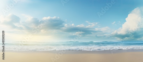 Fototapeta Naklejka Na Ścianę i Meble -  A beautiful nature background with a sandy beach serene sea and expansive sky Great for a copy space image