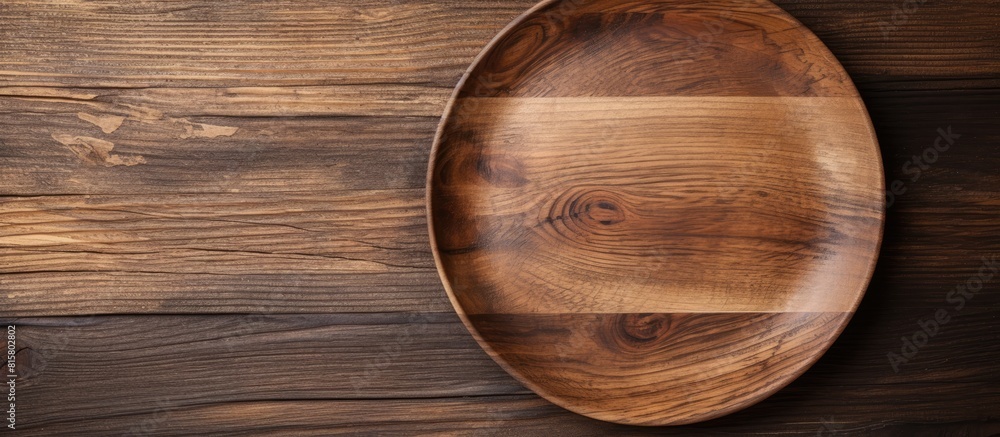 Copy space image Empty wooden dish displayed on a rustic wooden background Copy space image Empty wooden dish displayed on a rustic wooden background