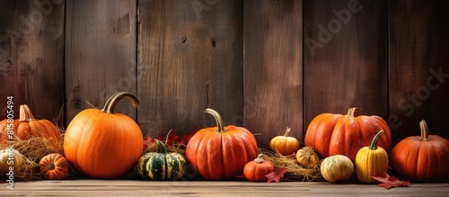 On a wooden table there is a harvest of pumpkins being cut creating a vibrant and rustic scene with plenty of copy space for images