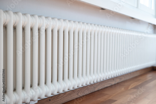 Wallpaper Mural Cast iron ribbed radiator or heater inside apartment room. Close up shot, no people Torontodigital.ca