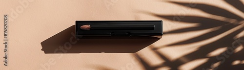 Mockup of an eyebrow pencil case with shaping gel, displayed on a minimalist backdrop for crafting perfect eyebrows photo