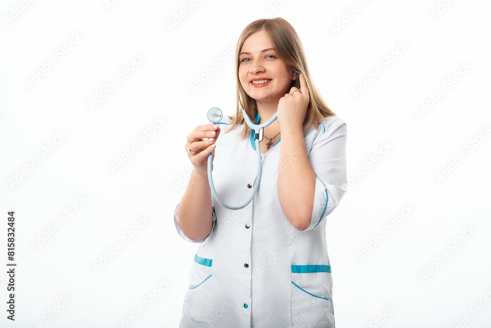 A girl pediatrician in a white coat with a stethoscope. Photo on a white background. Grain effect used A girl pediatrician in a white coat with a stethoscope. Photo on a white background. Grain effect used