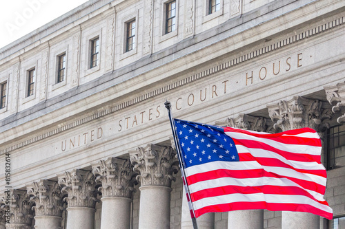 USA national flag waving in the wind in front of United States Court House in New York