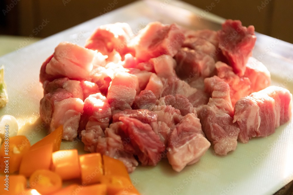Fresh meat and vegetable ingredients for a delicious stew. Fresh meat and vegetable ingredients for a delicious stew.