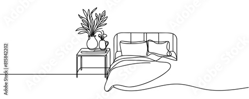 Continuous single line drawing of a double bed and table with a potted plant in a simple linear style. Vector illustration.