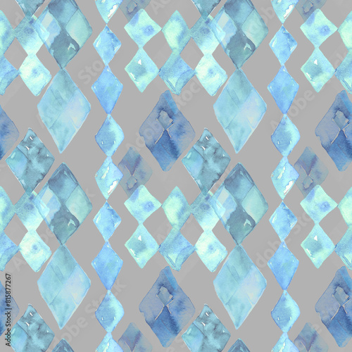 A seamless pattern with watercolor abstract diamonds of ice. Azure rhombus forms blending into gray background. Design for packaging, covers, surfaces, fabric. Winter tile with Geometry snowflakes. (ID: 815877267)