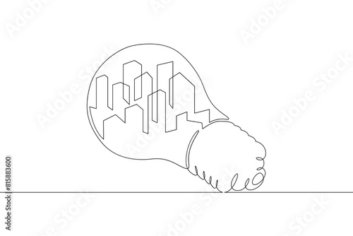 One continuous line.Ecology symbol.City in a light bulb. Energy saving. An environmentally friendly city. One continuous drawing line logo isolated minimal illustration.