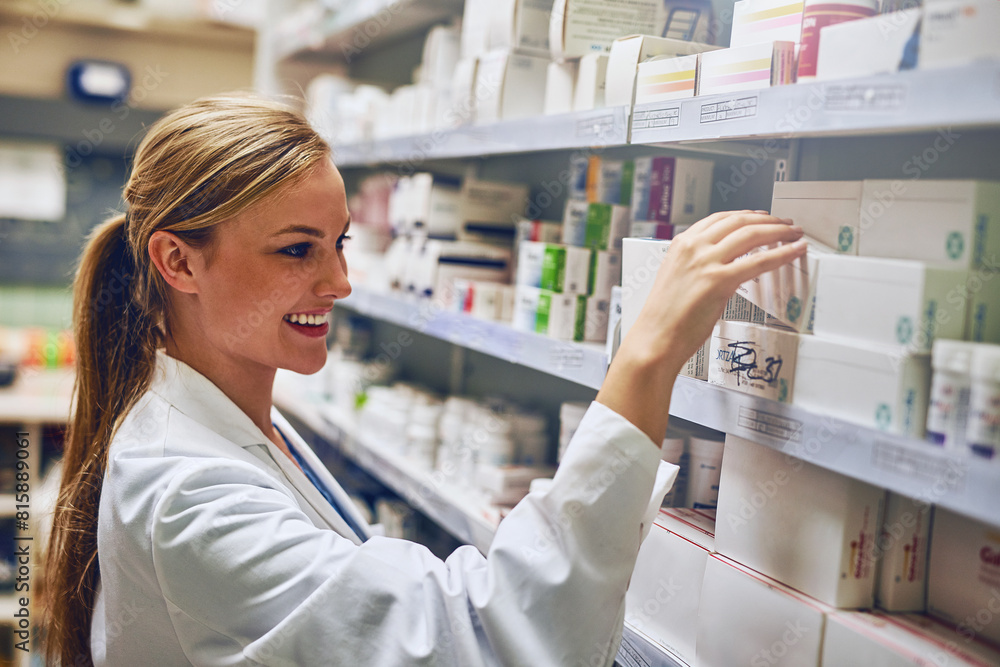 Happy woman, pharmacist or reading medicine for stock check at pharmacy for pills information. Healthcare, medical internship or girl by shelf for pharmaceutical drugs for boxes or product inventory