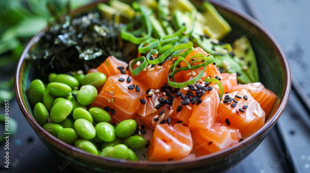 A colorful poke bowl filled with fresh salmon cubes, avocado, edamame, and seaweed salad, a trendy and nutritious meal option.