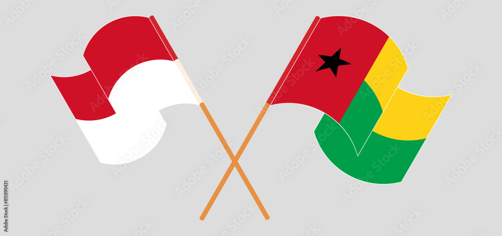 Crossed and waving flags of Indonesia and Guinea-Bissau Crossed and waving flags of Indonesia and Guinea-Bissau