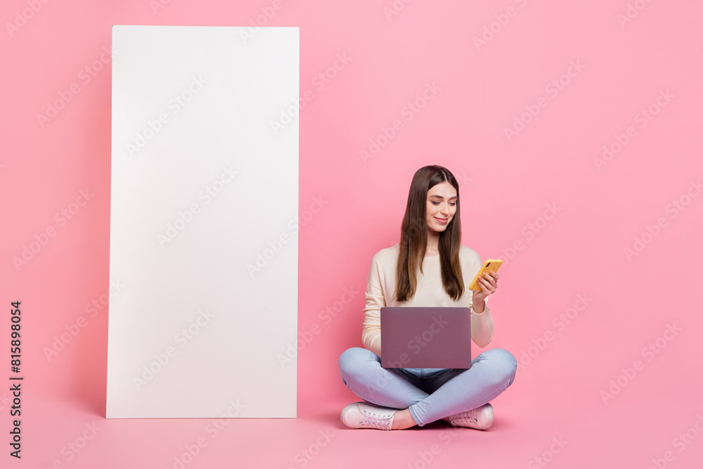 Portrait of beautiful trendy cheery girl using laptop device gadget copy space ad isolated over pink pastel color background Portrait of beautiful trendy cheery girl using laptop device gadget copy space ad isolated over pink pastel color background