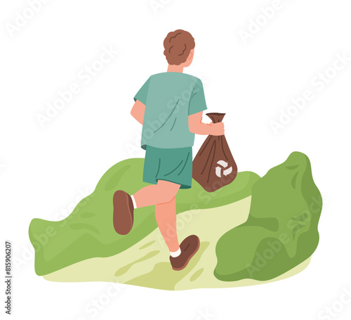 Man jogging and collecting trash in park.