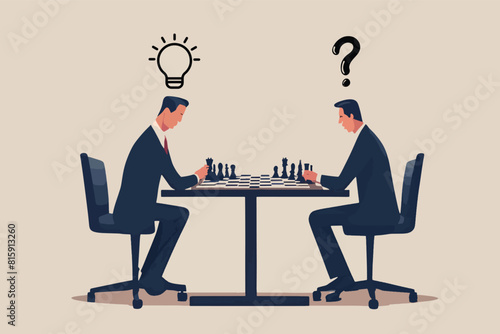 arranging a strategy in facing competition, a businessman is playing chess with a business partner