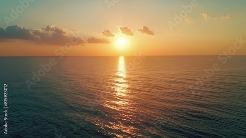 aerial view of beautiful sunset over calm sea seascape from above