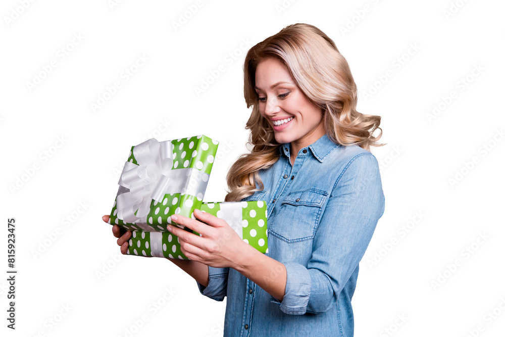 Portrait of her she nice cute charming winsome adorable attractive cheerful wavy-haired lady looking at new gift green box isolated over gray violet purple pastel background Portrait of her she nice cute charming winsome adorable attractive cheerful wavy-haired lady looking at new gift green box isolated over gray violet purple pastel background