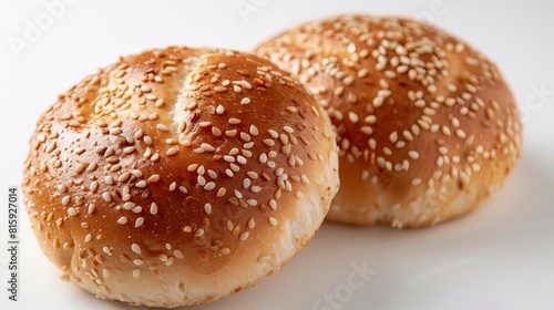 Top view of classic sesame seed buns with a golden exterior, showcasing their soft and fluffy texture, isolated background, studio lighting, perfect for advertising