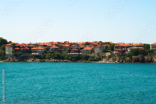 View onto the old town of Sozopol, Sosopol with the intense turquoise blue water of the black sea in the foreground, Bulgaria