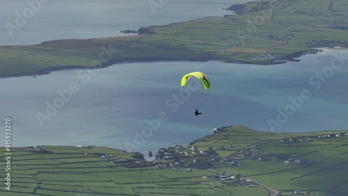 Drone footage of paraglider flying above Dingle, Ireland 4K Mavic 3 Pro photo