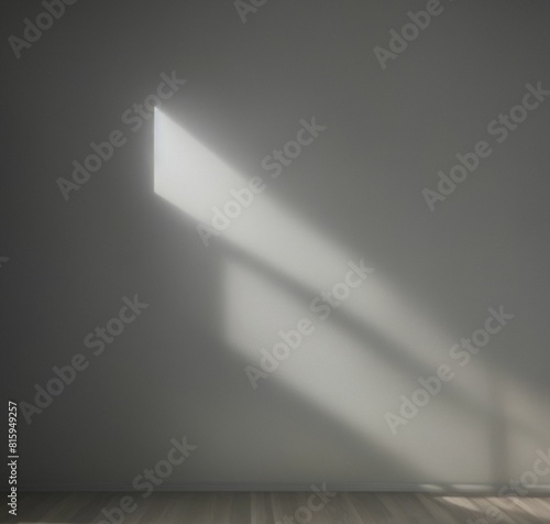room with lighting and shadows with gray wall
