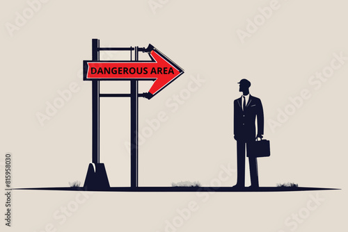 business risk, problem solving, businessman standing next to danger sign