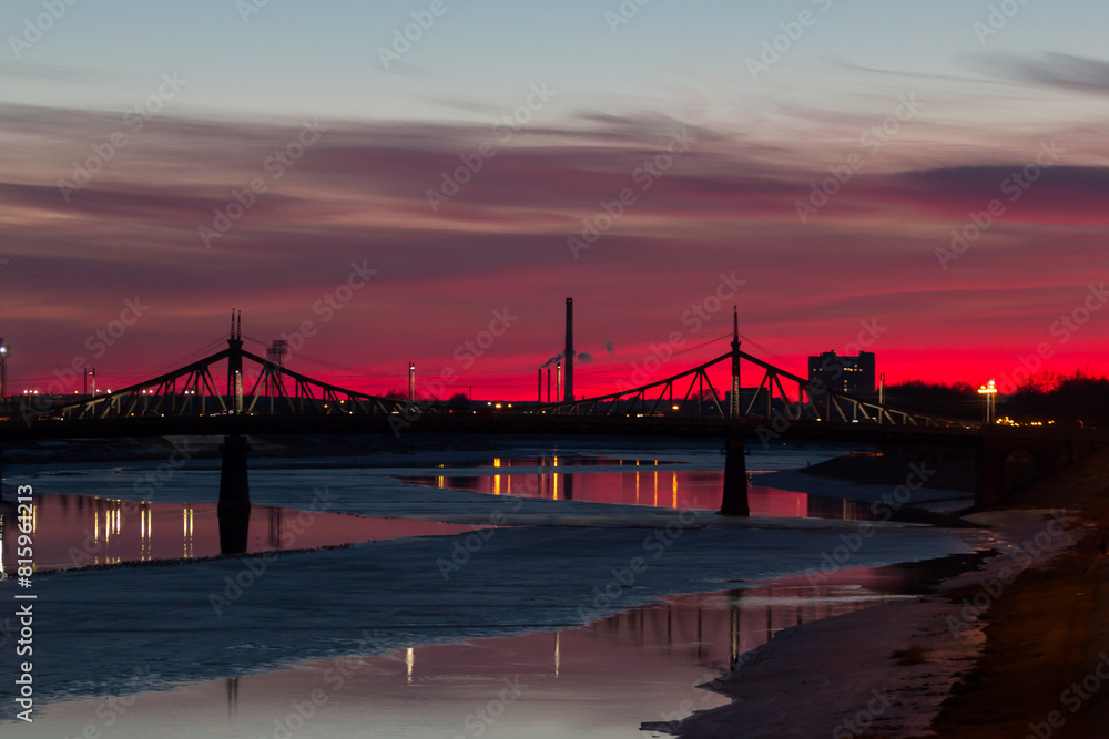 Fototapeta premium Panoramic view on Volga River during in March during sunset