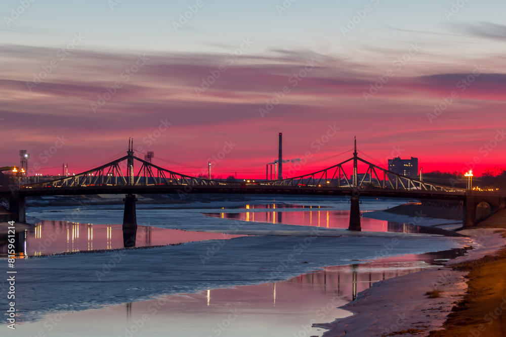 Fototapeta premium Panoramic view on Volga River during in March during sunset