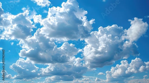 Daytime showcasing a lovely blue sky adorned with fluffy white clouds photo